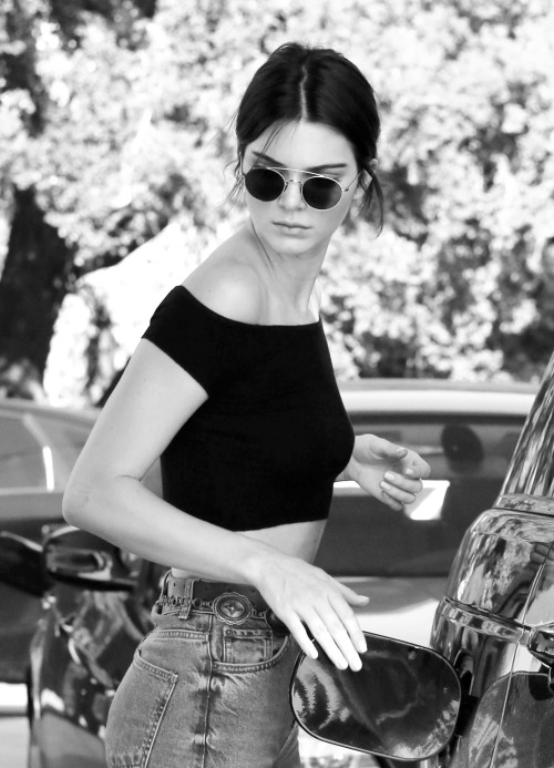 Kendall Jenner was spotted pumping her own gas in Calabasas. The reality star was wearing high-waisted jeans, July 30, 2015 X17online.com